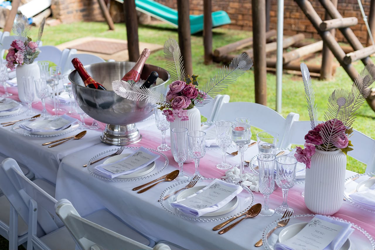 Pink and white birthday tablescape